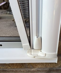 Pivoting base bar lifted clear of the threshold